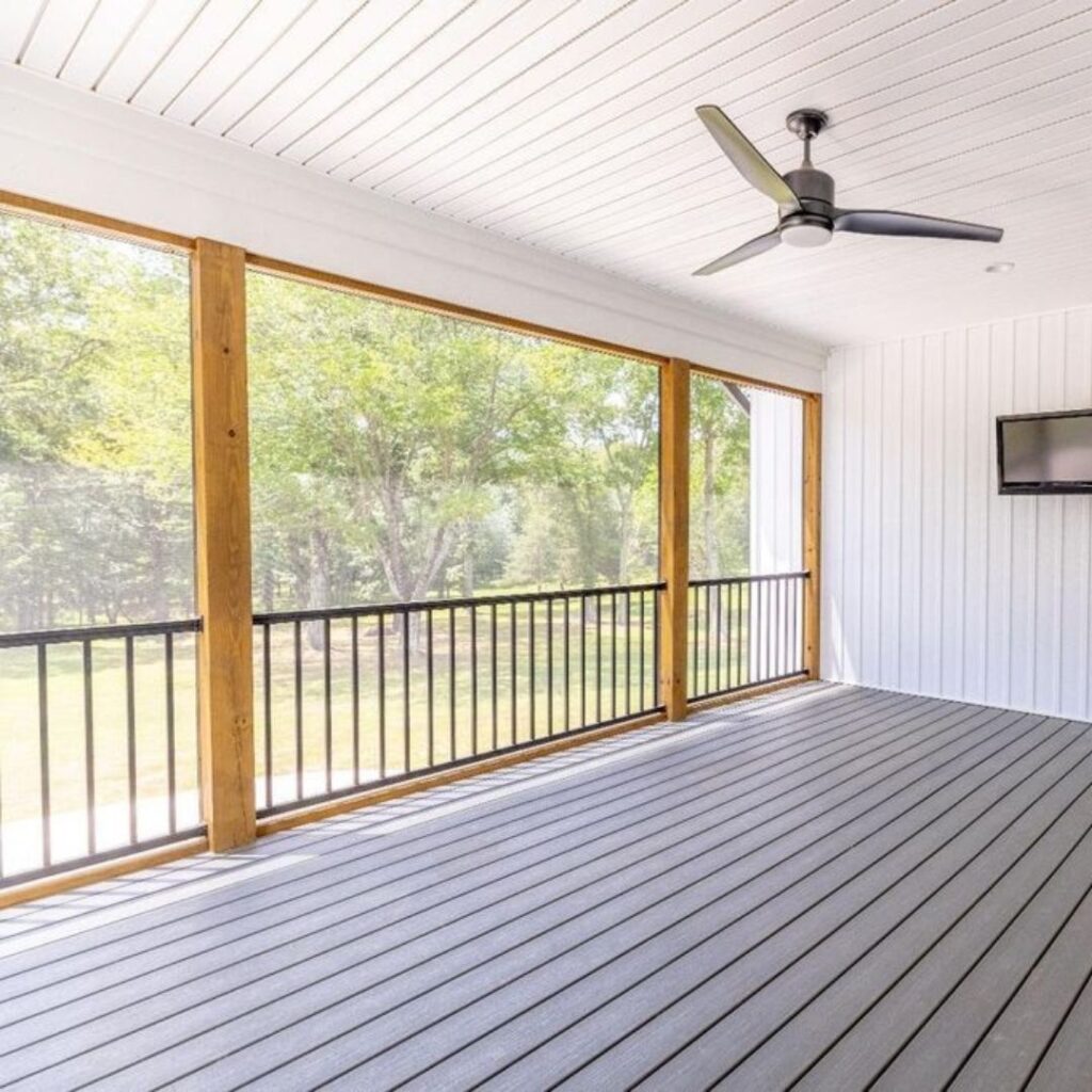 outdoor patio with a ceiling fan