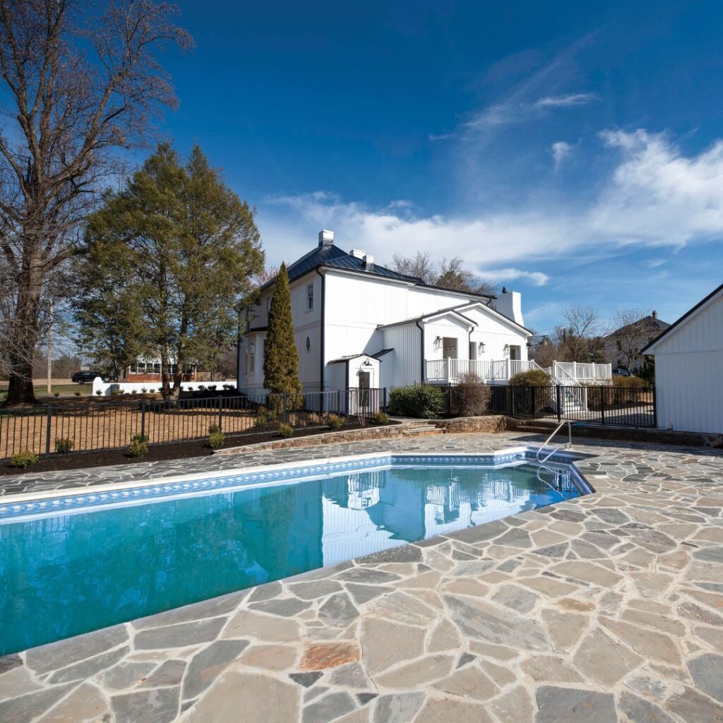 a large pool surrounded by stone